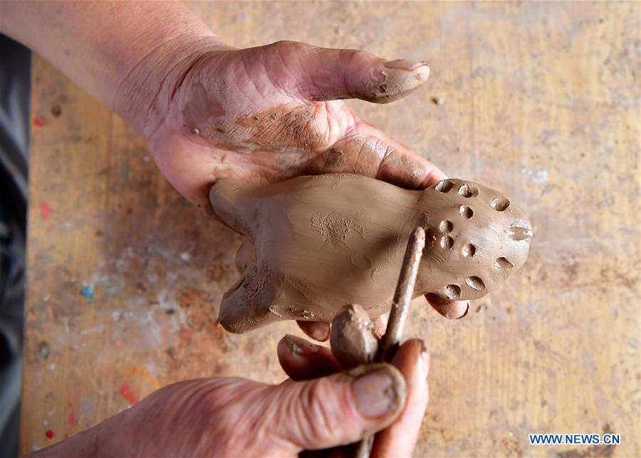 CHINA-HUAIYANG-CLAY DOG(CN)