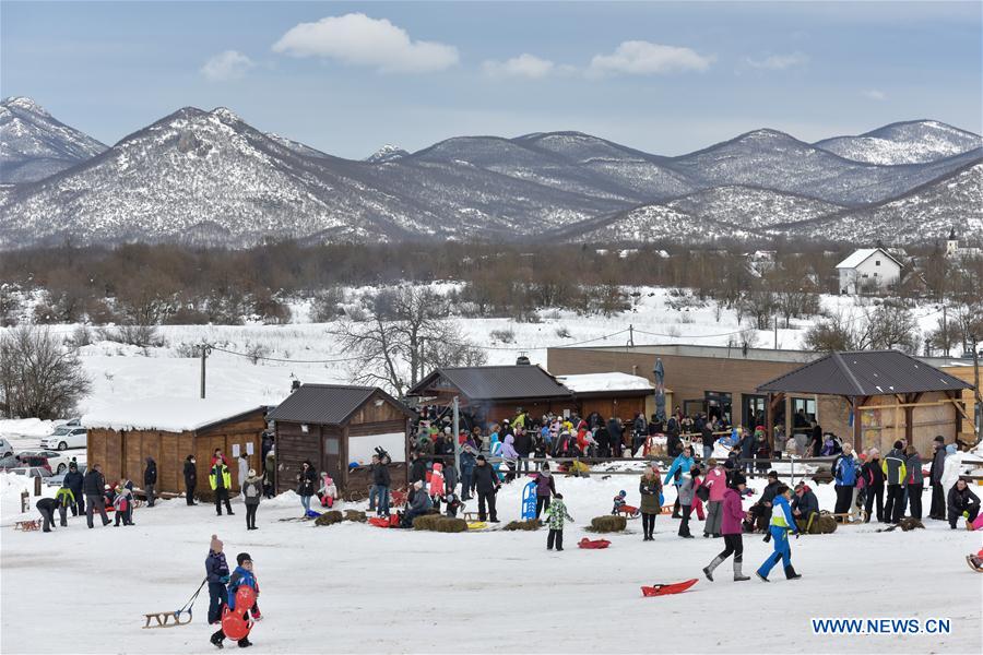 CROATIA-LOVINAC-SNOW-SLEDGING