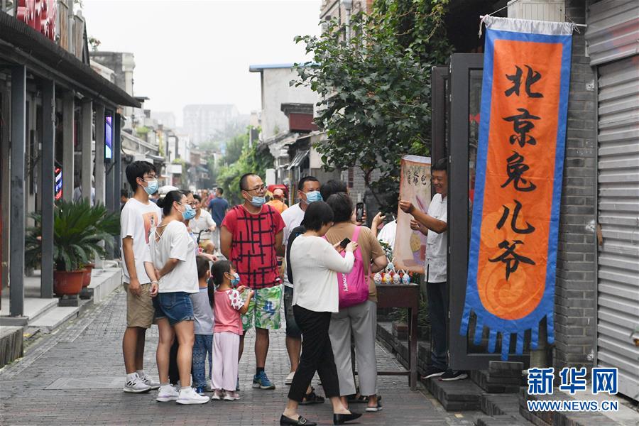 （走向我們的小康生活·圖文互動(dòng)）（5）小橋、流水、書(shū)香、人家——老北京胡同里的恬靜棲居